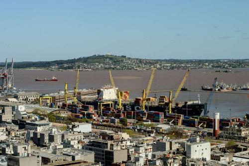 a view of a harbor with a ship in the water at Radisson Montevideo Victoria Plaza Hotel in Montevideo
