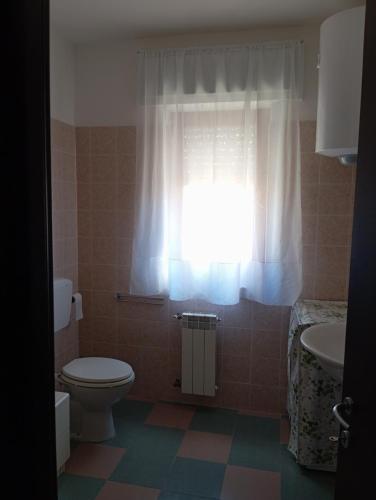 Koupelna v ubytování Aria di campagna