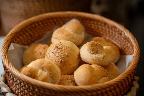 a basket full of bagels sitting on a table at ANNAM HERITAGE - Thuy Duong 3 in Hoi An