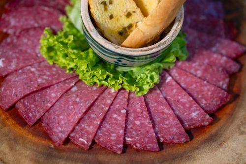 a plate of crackers and a sandwich on a table at ANNAM HERITAGE - Thuy Duong 3 in Hoi An