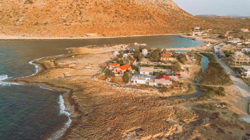 an aerial view of a small town on the beach at Blue Lagoon Villa in Stavros