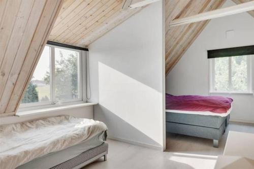 Una cama o camas en una habitación de Ps House
