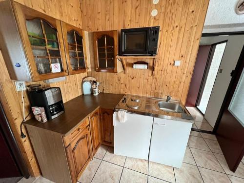 Kuchyň nebo kuchyňský kout v ubytování Apartmány Merkel