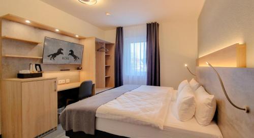 Katil atau katil-katil dalam bilik di Hotel Schwarzes Ross