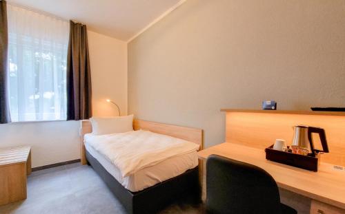 Katil atau katil-katil dalam bilik di Hotel Schwarzes Ross