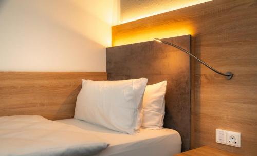 Katil atau katil-katil dalam bilik di Hotel Schwarzes Ross