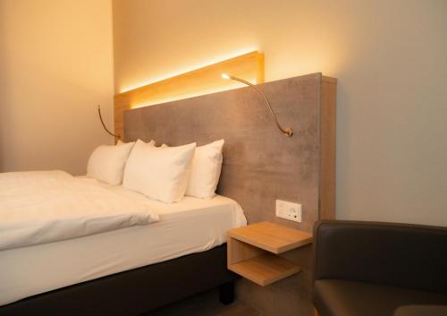 Katil atau katil-katil dalam bilik di Hotel Schwarzes Ross