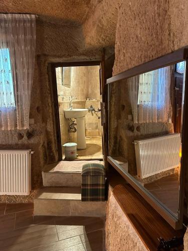 En eller flere senge i et værelse på Coco Cave