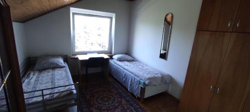 Postel nebo postele na pokoji v ubytování Adam room 5