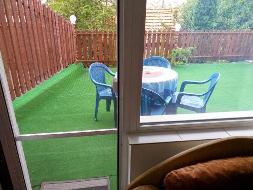 a view of a patio with a table and chairs at Zodiac House in Samokov