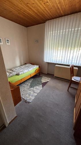 Кровать или кровати в номере Haus Gudrun