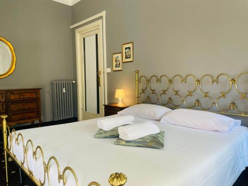Posteľ alebo postele v izbe v ubytovaní GASTALDI ROOMS - Old Style