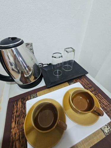 Příslušenství pro přípravu čaje a kávy v ubytování Candy Beach Seaview Jomtien