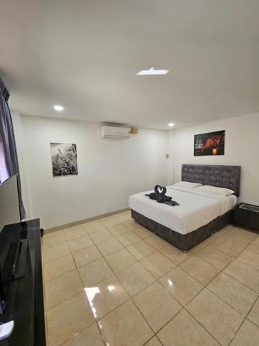 Postel nebo postele na pokoji v ubytování Candy Beach Seaview Jomtien