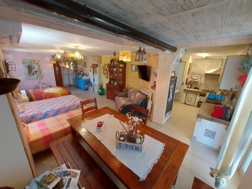 a living room with a couch and a table in it at A casa di Sandra, costa dei Trabocchi in Paglieta