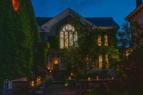 a house with a lot of candles in front of it at Church Des Artistes in Kingston