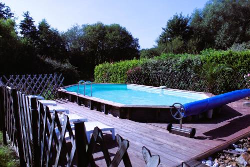 Swimmingpoolen hos eller tæt på GITE 15 personnes confort et authenticité