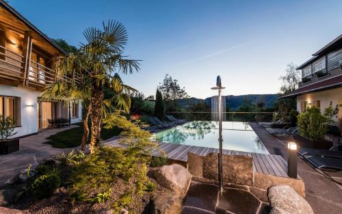 Bazén v ubytování Presulis Hideaway Apartments & Restaurant nebo v jeho okolí