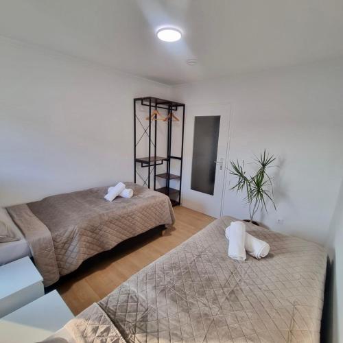Ferienwohnung Fleiger 4 in Achim Zentrumにあるベッド