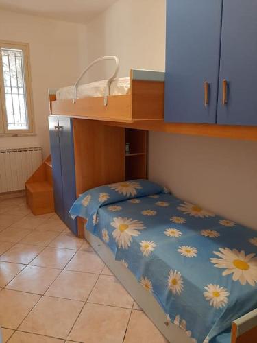 Ένα ή περισσότερα κρεβάτια σε δωμάτιο στο Casa Vacanze Anthea Carini