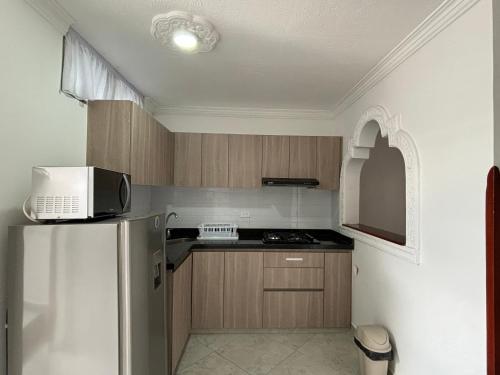 Kuchyň nebo kuchyňský kout v ubytování ApartahotelVacacionalSangil
