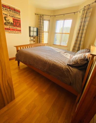 Ένα ή περισσότερα κρεβάτια σε δωμάτιο στο Wheelers Inn