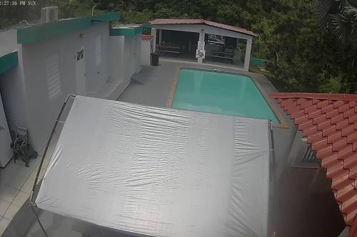 an overhead view of a swimming pool on a building at Casa CAMPO Privada Con Piscina in Barceloneta