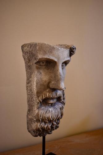 a statue of a man with a beard on a stand at Grand Arcanum Apartment 2 - Comfortable and Elegant in Senglea