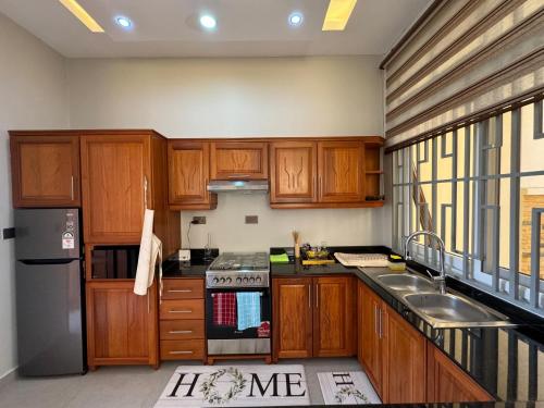 Dapur atau dapur kecil di Acadia Apartment Dodoma