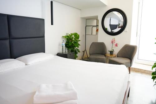 Cama o camas de una habitación en Valhalla Boutique Hotel