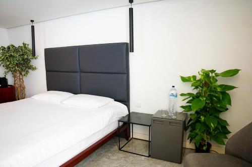 Cama o camas de una habitación en Valhalla Boutique Hotel
