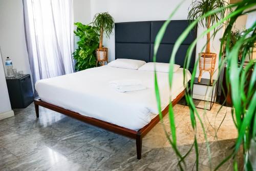 Cama o camas de una habitación en Valhalla Boutique Hotel