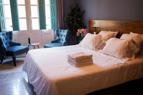 Cama o camas de una habitación en Valhalla Boutique Hotel