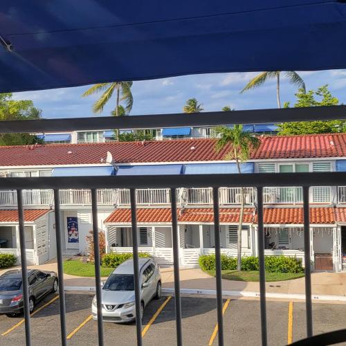 a view from a balcony of a building at Deluxe Beach Condo in Dorado in Dorado