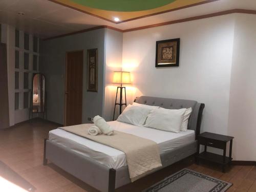 Llit o llits en una habitació de Maeganbeverly's Place