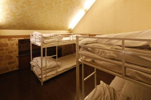 Voodi või voodid majutusasutuse Starry Sky Cottage12 toas