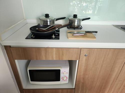 Η κουζίνα ή μικρή κουζίνα στο Bann Khao Yai 50 Sqm-Corner, King bed, Balcony