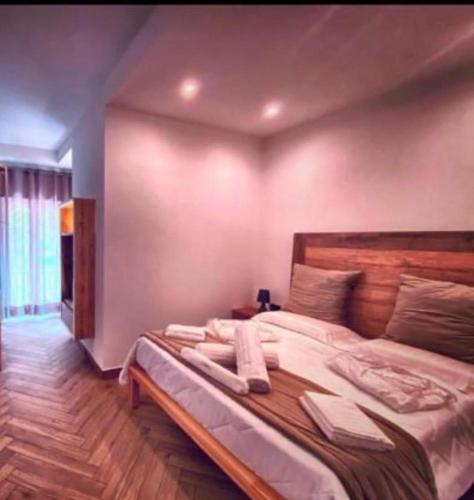 a bedroom with a large bed in a room at Suite Pizzo jacuzzi rooms in Pizzo