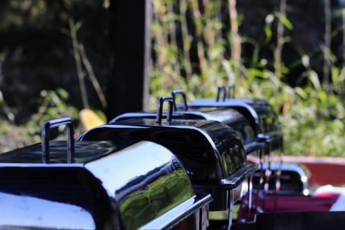 a row of suitcases lined up in a row at Hotel Dhulikhel View Point in Dhulikhel