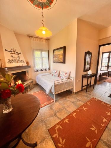 Ένα ή περισσότερα κρεβάτια σε δωμάτιο στο Guesthouse Filokalia