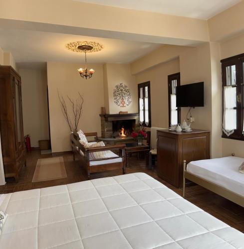 Ένα ή περισσότερα κρεβάτια σε δωμάτιο στο Guesthouse Filokalia