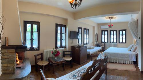 Ένα ή περισσότερα κρεβάτια σε δωμάτιο στο Guesthouse Filokalia