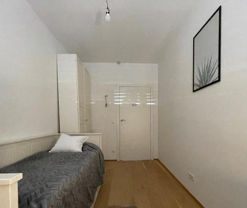Ein Bett oder Betten in einem Zimmer der Unterkunft Green Garden Apartments