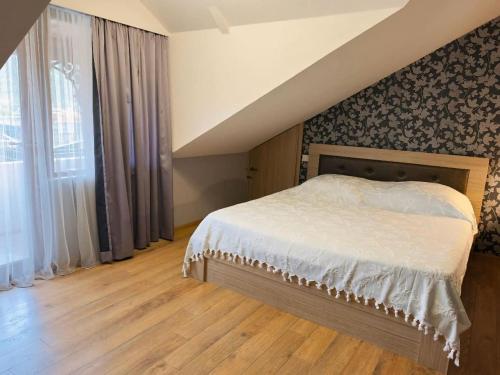 Postel nebo postele na pokoji v ubytování Apartment Antiokia