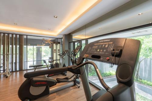 a gym with two exercise bikes in a room at Panoramic Pool at The Valley in Pak Chong