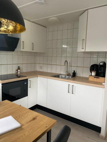 Dapur atau dapur kecil di Boshuisje met airco!