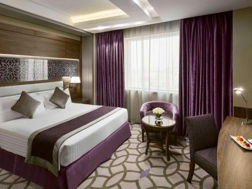 Movenpick Hotel Qassimにあるベッド