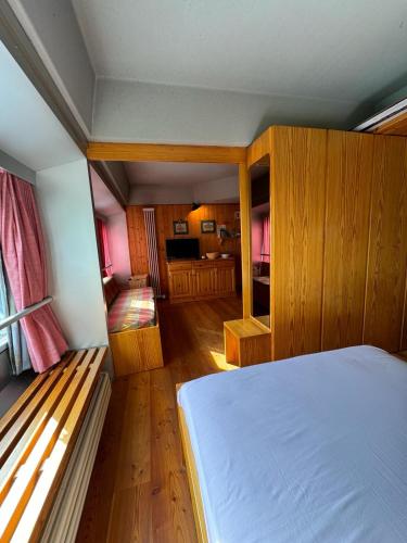 Postel nebo postele na pokoji v ubytování Casetta al Sole Alto