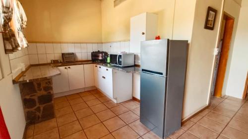 Kuchyň nebo kuchyňský kout v ubytování Modubu Lodge