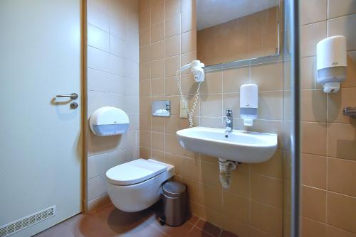 Koupelna v ubytování Nykščio Hostel